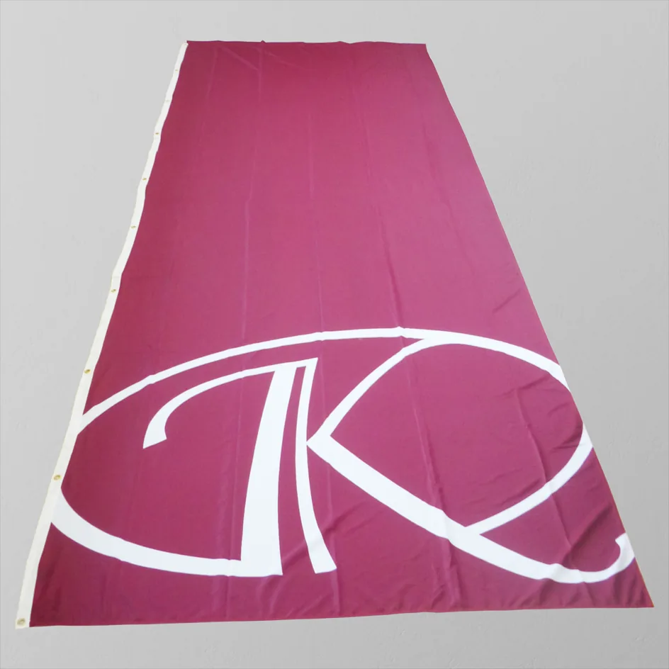 Custom grommet banner with printed logo in magenta