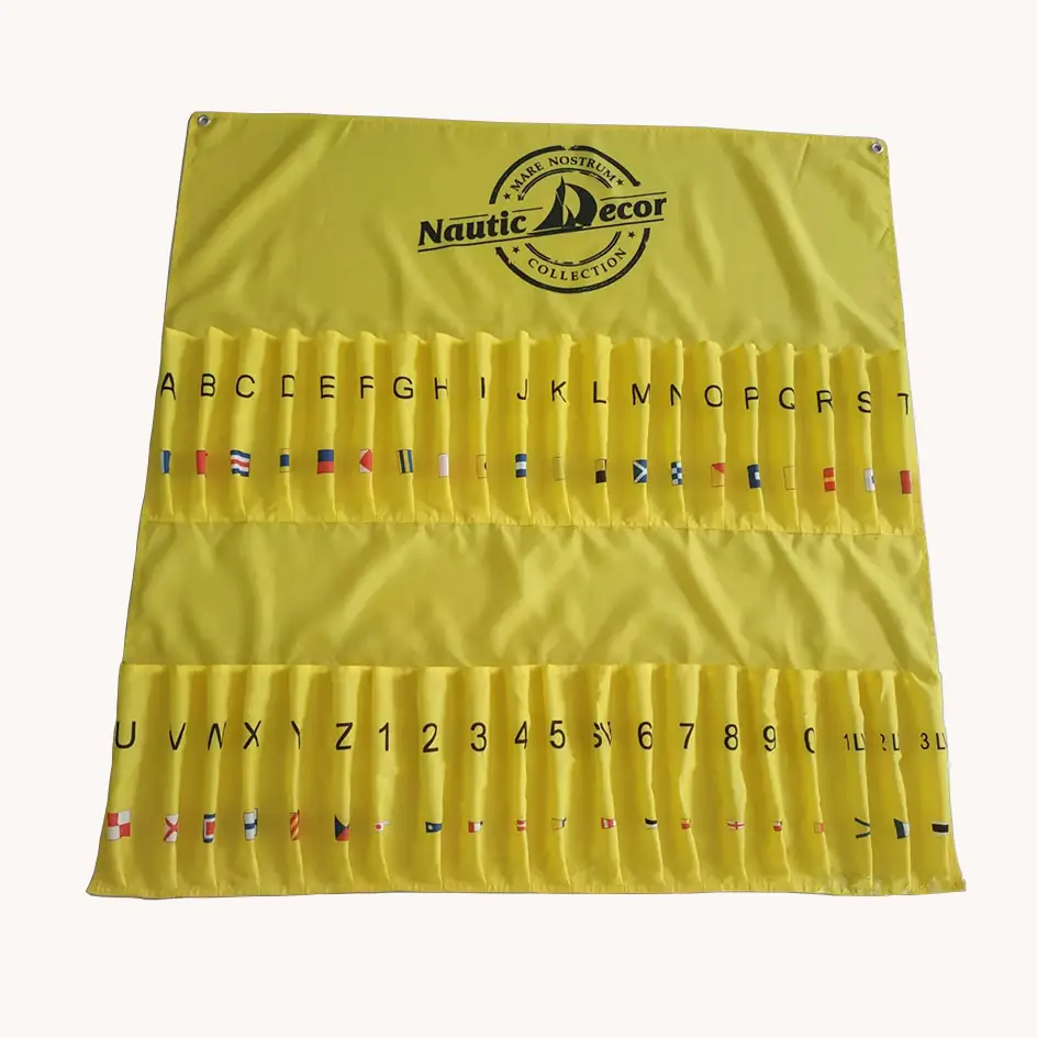 Complete maritime signal flag set stored in a yellow roll-up pocket organizer with labelled slots for A to Z and numeral flags