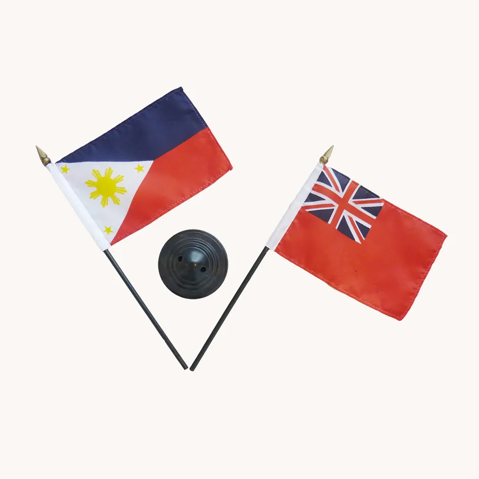 Table desk flag set with two printed mini flags on black poles and a round black base for office and conference display